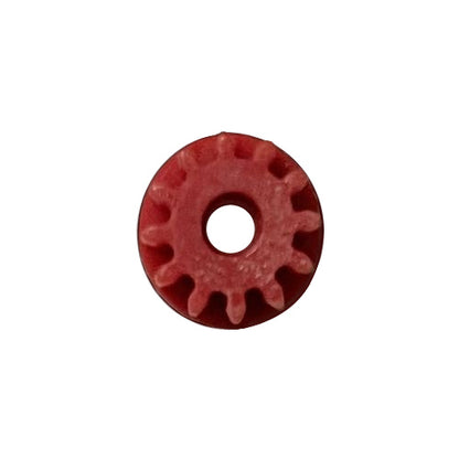 Top view of a small red plastic odometer gear with 12 teeth for various BMW and Mercedes models.